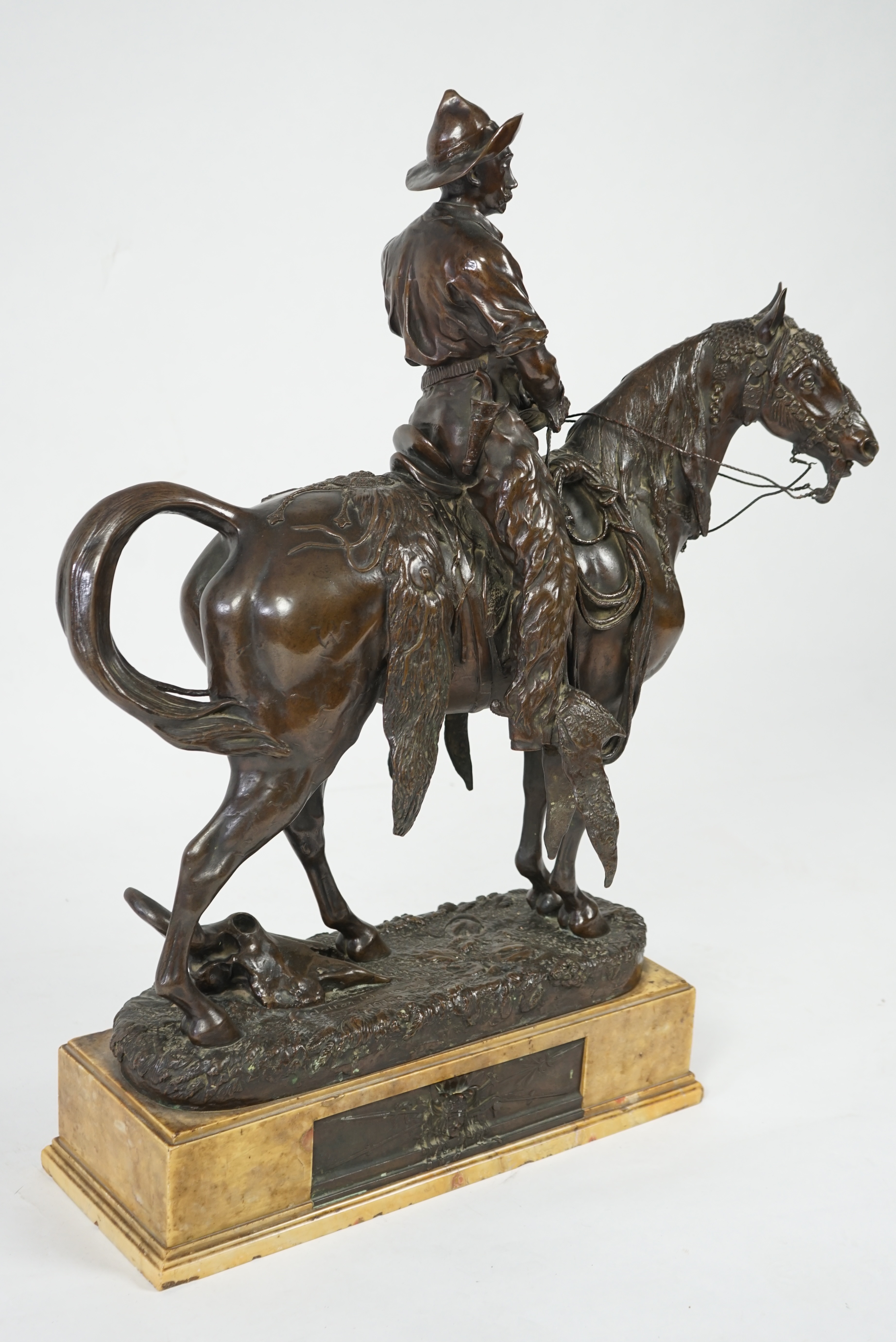 Walter Winans (St. Petersburg, 1852-Parsloe Park, Essex, 1920), a cast bronze of the artist, as a cowboy, riding the Arab stallion Skowronek, 50cm wide, 66cm high, overall 79.5cm high